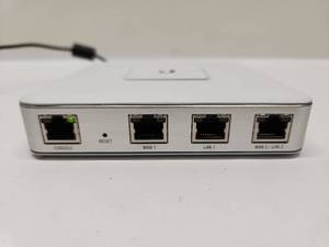 lot 28 image: Ubiquiti UniFi Security Gateway USG 12V 1A Network Router