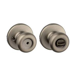 lot 61412 image: Kwikset Tylo Privacy Knob Antique Brass