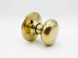 lot 61414 image: Kwikset Cove Dummy Door Knob Brass 94880-615