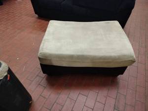 lot 25875 image: Upholstered Ottoman with Cream Cushion and Black Base