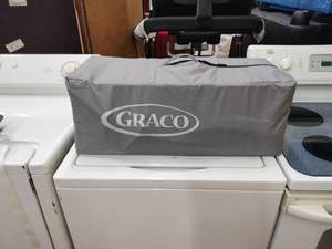 lot 25880 image: Graco Portable Compact Baby Travel Playard with Carry Bag