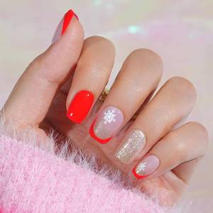 lot 29564 image: Red Press On Nails Short - Jofay Fashion French Tip Press On Nails, Acrylic Fake Nails with Snowflakes and Gold Glitter, Reusable False Nails Glue On Nails for Women, Stick On Nails Kit 32Pcs - Retail $7