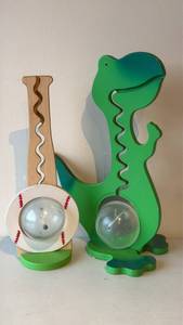 lot 14 image: Baseball Bat and Dinosaur Shaped Bubble Blowers 2 Piece Set - Retail $0