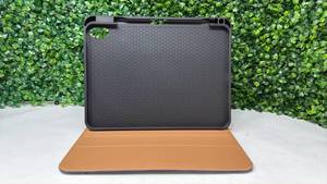 lot 121 image: iPad Case with Stand Black and Tan - Retail $0