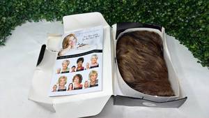 lot 147 image: Toni Brattin Wig with Kanekalon Changelite Fiber and Styling Guide - Retail $0