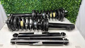 lot 171 image: For jeep Pair of Coil Spring Struts with Lower Control Arms - Retail $0