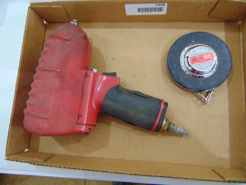 lot 2408 image: Impact Wrench & 50 ft Lufkin Tape Measure