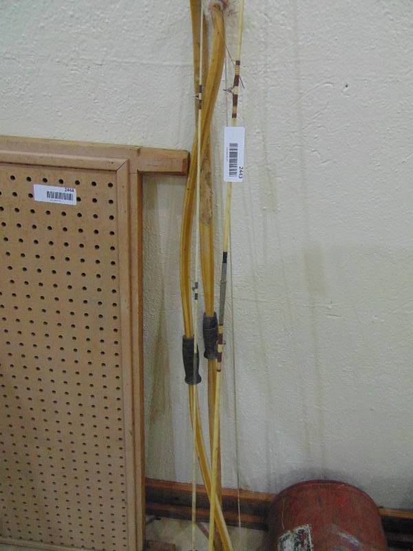 lot 2443 image: Fishing Poles & Bow