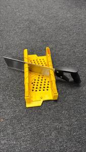 lot 149 image: Yellow Plastic Grater with Black Handle - Retail $30