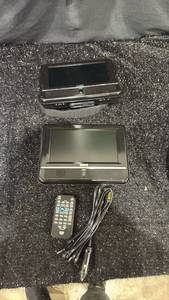 lot 39 image: RCA Portable DVD Player��s with Remote and Car Adapter