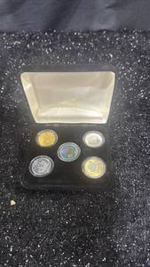 lot 63 image: 5-Coin Encapsulated Set Kansas 1821 2005 Gold Silver Colored