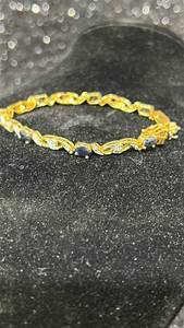 lot 68 image: Gold-Tone Bracelet with Dark Blue Stones and Rhinestones