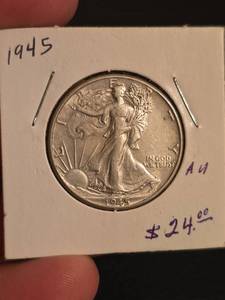 lot 63 image: 1914 AU Walking Liberty Silver half dollar