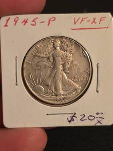 lot 64 image: 1945-P Walking Liberty Silver half dollar