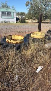 lot 421 image: Lot of 2 Yellow Metal Grain Bins with Tires