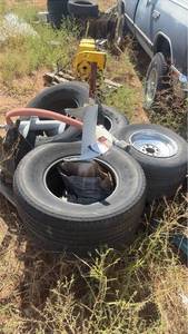 lot 424 image: Lot of Used Tires with Wheels and auger