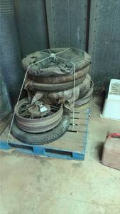 lot 431 image: Lot of Used Vehicle Wheels and Tires on Blue Pallet for model A ford