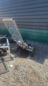 lot 742 image: Landforce Skid Steer Winch Attachment 15000lb with Mesh Guard