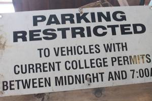 lot 4662 image: Metal Parking Restricted Sign 12 x 24