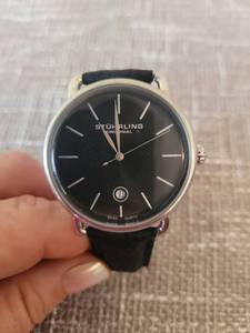 lot 6 image: Stuhrling Original Quartz Watch Black Dial Black Leather Strap Needs Battery