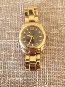 lot 9 image: Gold-Tone Wristwatch with Black Dial and Diamond Markers