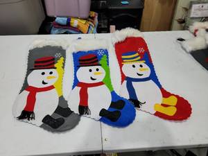lot 719 image: Snowman Stocking Holders Set of 3 Christmas Decorations