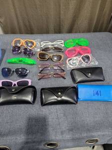 lot 747 image: Lot of Sunglasses and Eyeglasses with Cases and Accessories