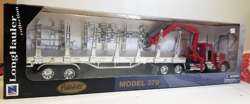 lot 1626 image: Long Hauler Collection Peterbilt Log Semi Model 379See Pix  NIB
