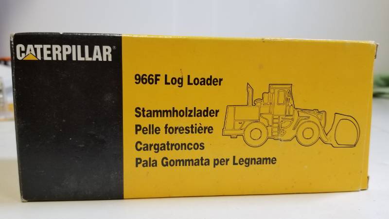 lot 1648 image: CAT 966F Log Loader  appears to be 150 scale  NIB