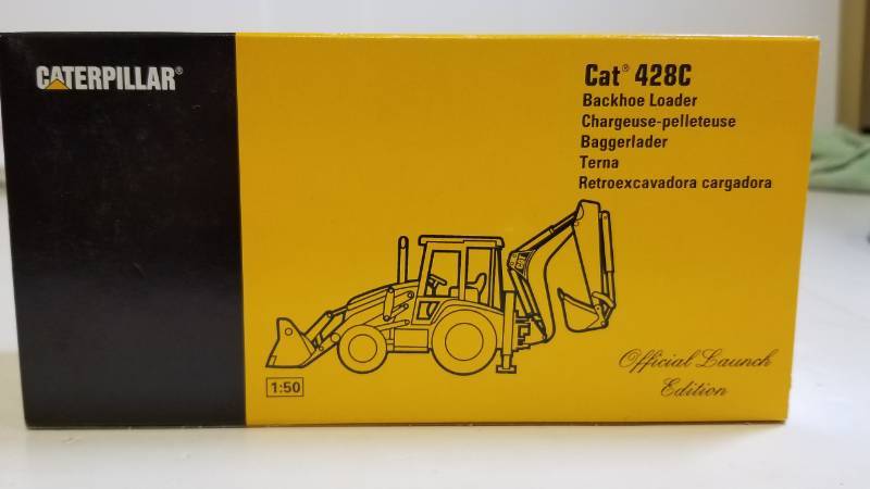 lot 1653 image: CAT 428C Backhoe Loader  150 scale  NIB