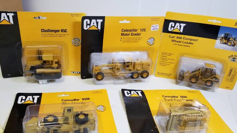lot 1656 image: 1 lot - 5 CAT equipment  GraderloaderChallengerTrack Tractorwheel loader  see pix  NIB