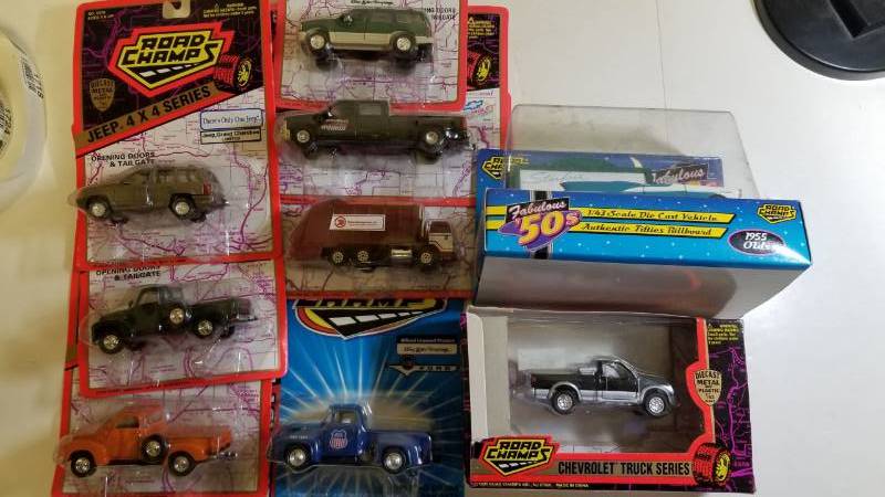 lot 1718 image: 1 Lot 9 items  Road  Champs Toys pickup and trucks  See Pix  NIB