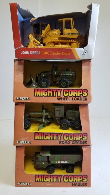 lot 1724 image: ERTL 4 items  3 Mighty Corps  1 Dozer  164 scale  See Pix  NIB