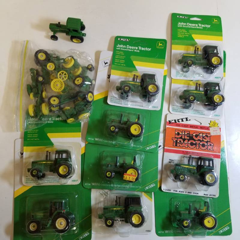 lot 1687 image: 1 lot  ERTL  19 items  164scale   11 JD Tractors (in box)  8 Tractors (not in box)  See Pix