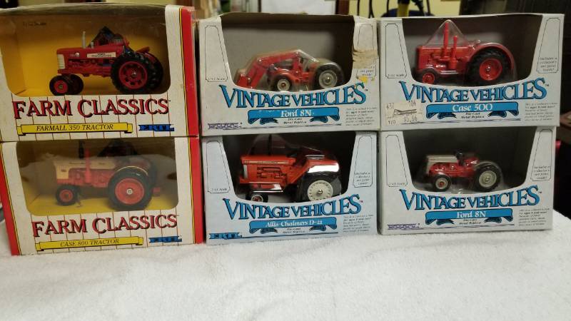 lot 1754 image: 6 items, 143 scale TractorsFord 8N wLoaderCase 500Farmall 350Ford 8NCase 800AC D21 NIB