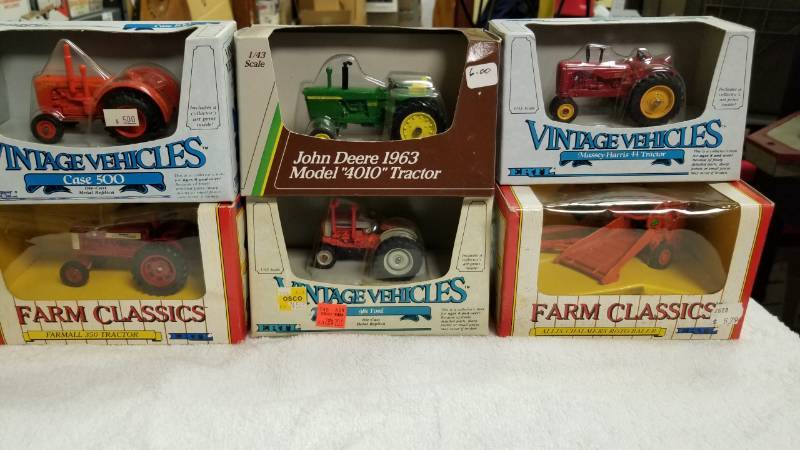 lot 1755 image: 6 items, 143 scale981 FordMassey Harris 44Case 500Farmall 350JD 4010AC Round Bailer NIB