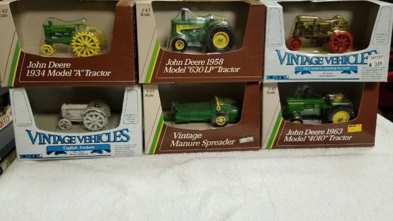 lot 1756 image: 6 items 143 scaleJD 1958 630LP 1963 JD 4010 Farmall McCormic Derring 1934 JD AEnglish Fordson JD Manure Spreader  NIB