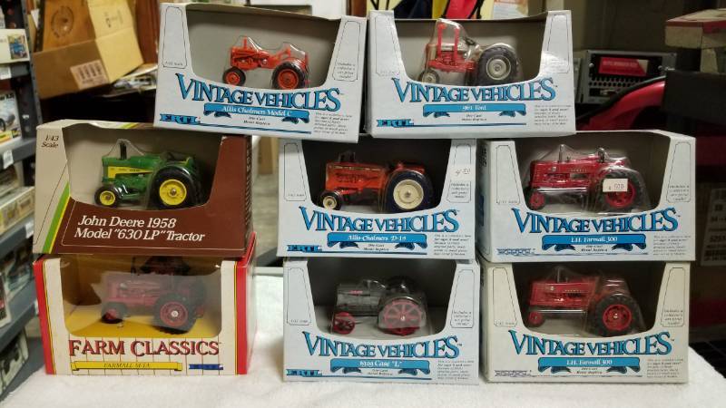 lot 1758 image: 8 each  143 Tractors  3 Farmall1 JD 2 AC  1 Ford 1 Case See Pix, NIB