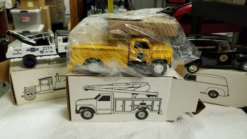 lot 1766 image: 3 each ERTL Bank Trucks 1950 Chevy PanelBucket Utility Truck1931 Hawkeye Wrecker Truck, See Pix, NIB