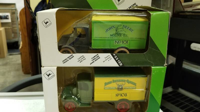 lot 1774 image: 2 each ERTL Bank TrucksJD No. 101, 125 scale, #531EBDeere Imp Co. No.103, 138 scale, #5564 NIB