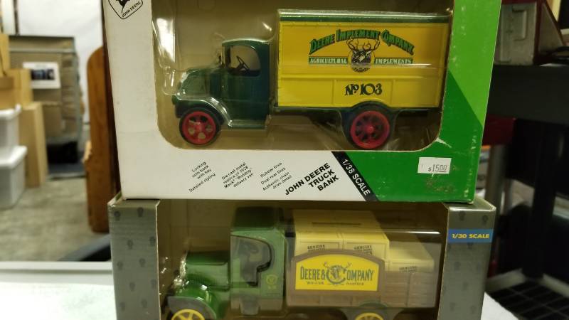 lot 1776 image: 2 each ERTL Bank TrucksDeere Co. No. 103, #5564  1925 Kenworth Bank Truck, 130 scale, #5689 NIB