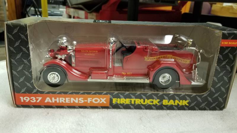 lot 1777 image: ERTL 1937 Ahrens-Fox Firetruck Bank, 130 scale, #5773, NIB