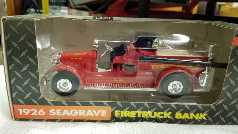lot 1778 image: ERTL 1926 Seagrave Firetruck Bank, 130 scale, #5710, NIB