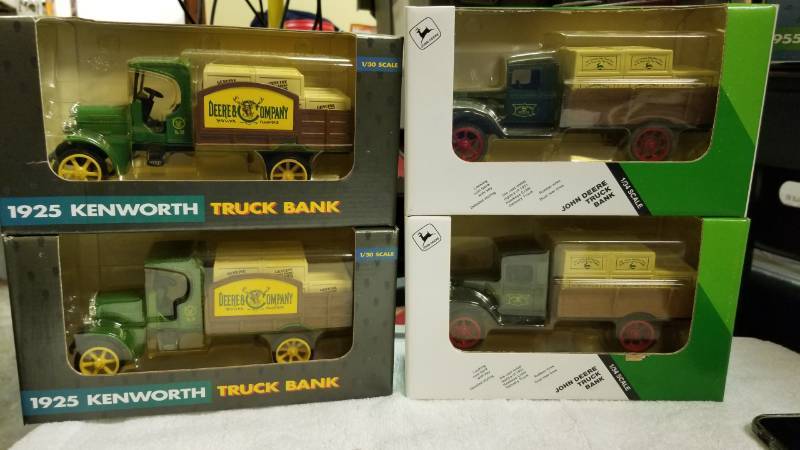 lot 1788 image: 4 each ERTL Bank Trucks, 2 ea. JD Trucks (#5687) 2 each Deere Co Trucks (#5689), NIB