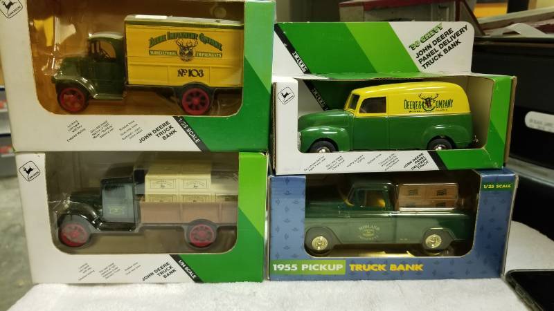 lot 1793 image: 4 each ERTL Bank Trucks  JD PanelJD Truck #103 1955 Pickup BankJD Bank Truck  134 scaleNIB