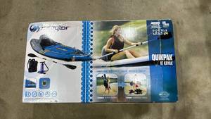lot 7 image: Sevylor Quikpak K1 Kayak with Paddle and Pump