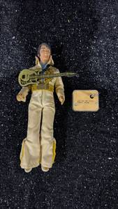 lot 14 image: Elvis Presley Action Figure with Guitar and Music Box