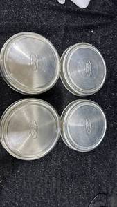 lot 22 image: Ford 4 Hubcaps Wheel Covers