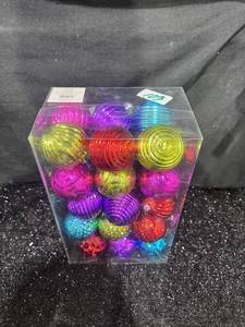 lot 103 image: Set of 16 Multicolor Ornament Balls in Clear Plastic Box