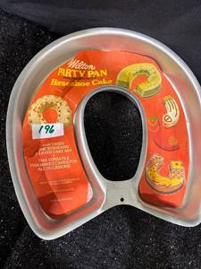 lot 196 image: Wilton Party Pan Horseshoe Cake Bake and Decorate